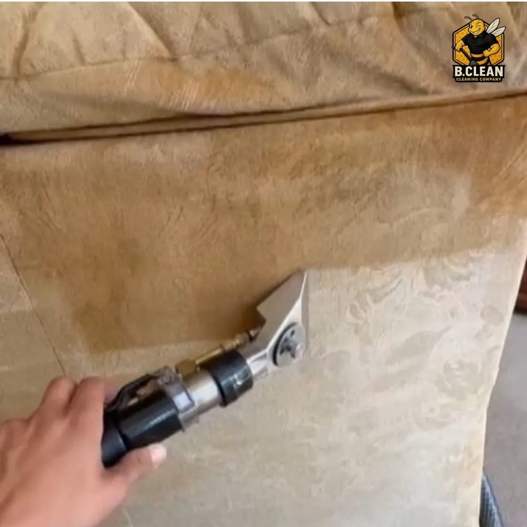 Channel 5s Brennan Budden of Filthy House SOS highlighting before and after clean of sofa. Showing how dirty brown the fabric was at the top and how pristine cream it gets as part of sofa & Upholstery cleaning in Kent by B Clean Cleaning